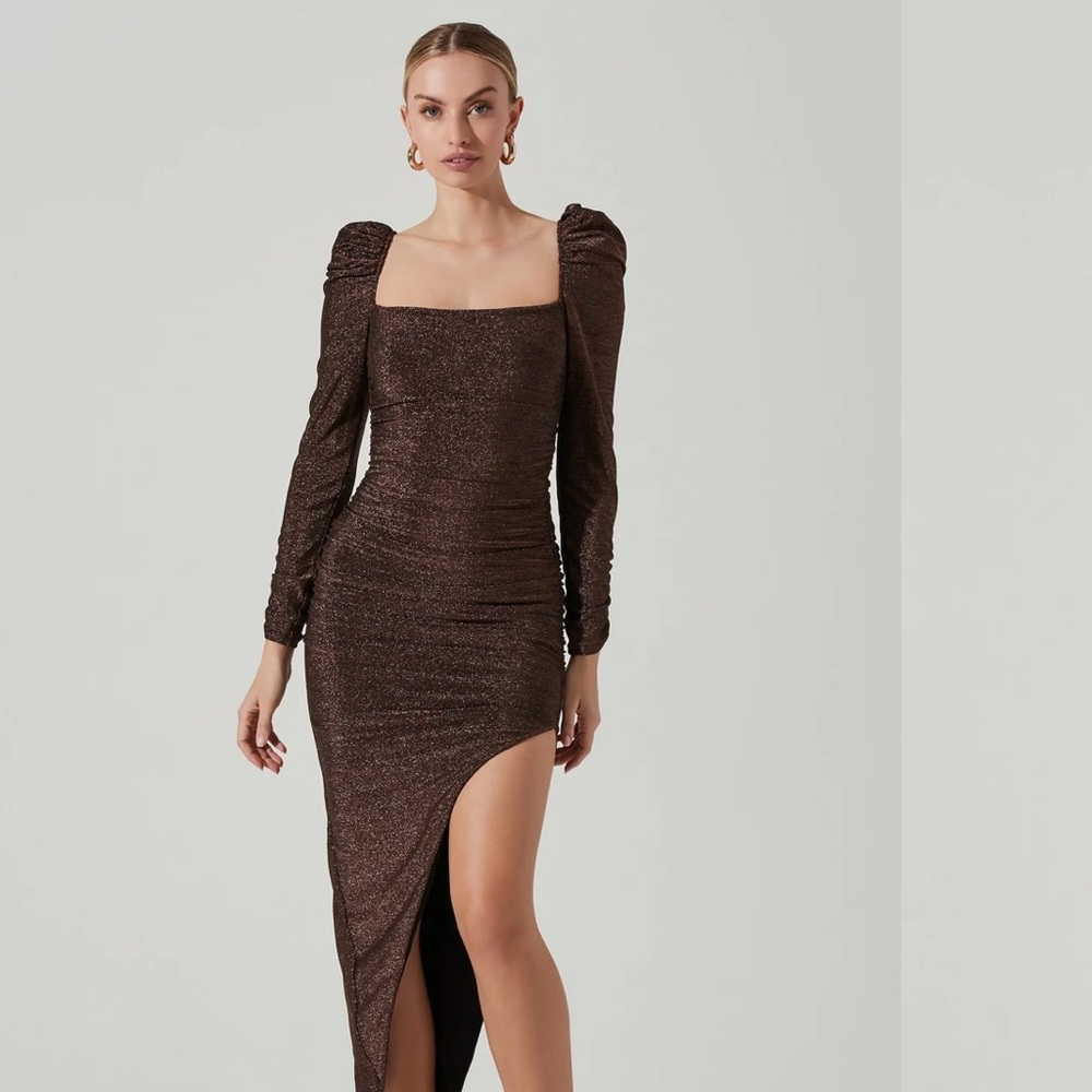 BRAND NEW tags are still on this dress. Never worn!!!